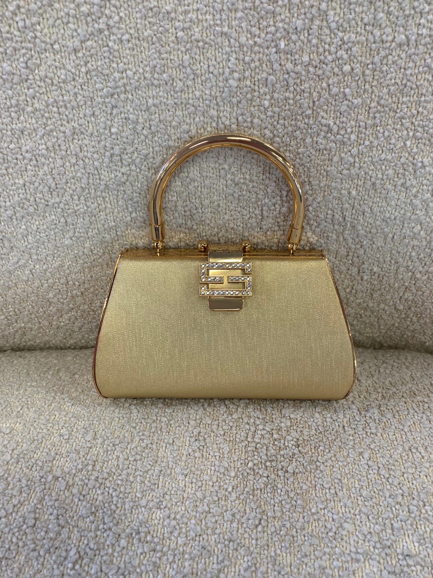 Gold handled mini bag